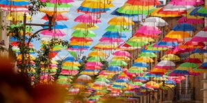 Colorful umbrellas more beautiful route